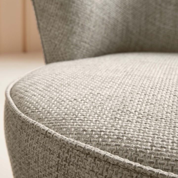 Barnabé woven linen fabric swivel armchair
