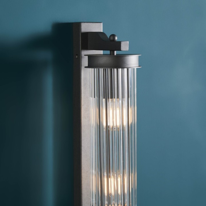 Metal tube wall light with grey metal finish and glass