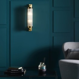 Gold brass finish metal wall light with glass tube