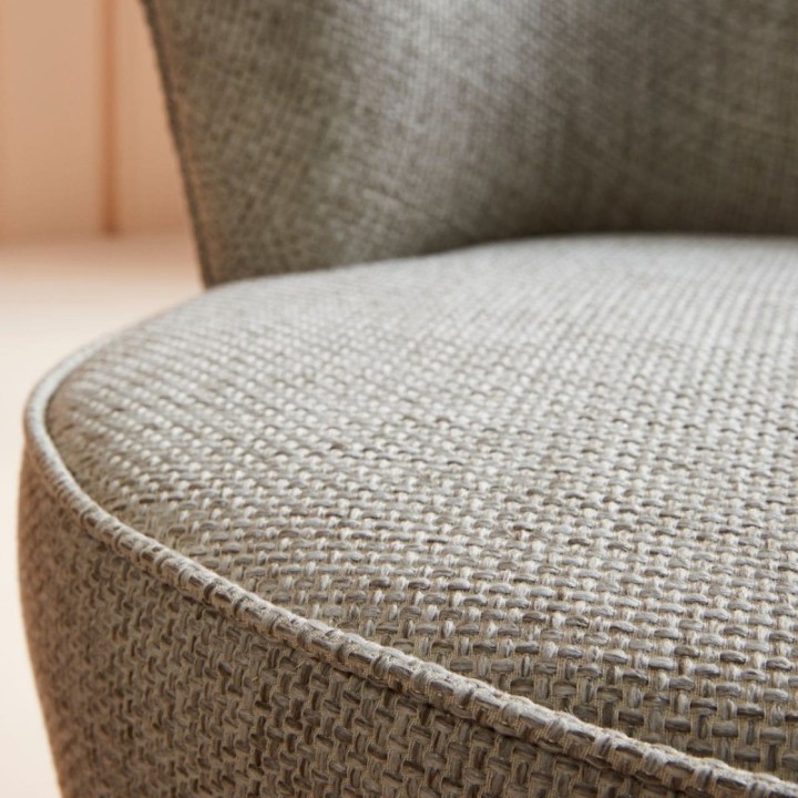 Barnabé woven linen fabric swivel armchair