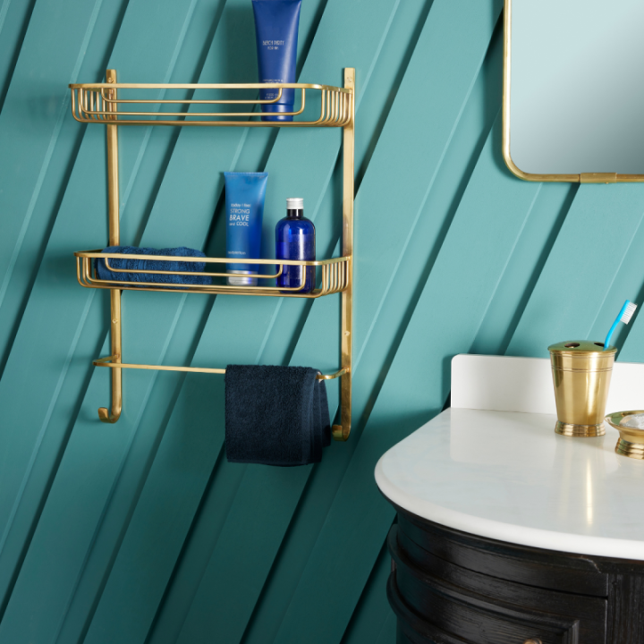 Two-tier gold brass wall shelf with towel rail