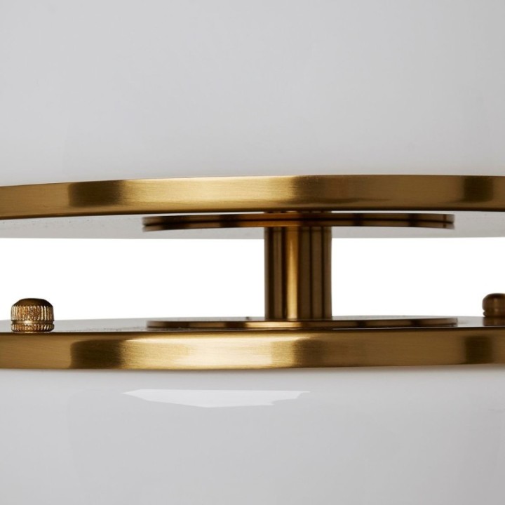 Montparnasse gold metal pendant light with opaline globe