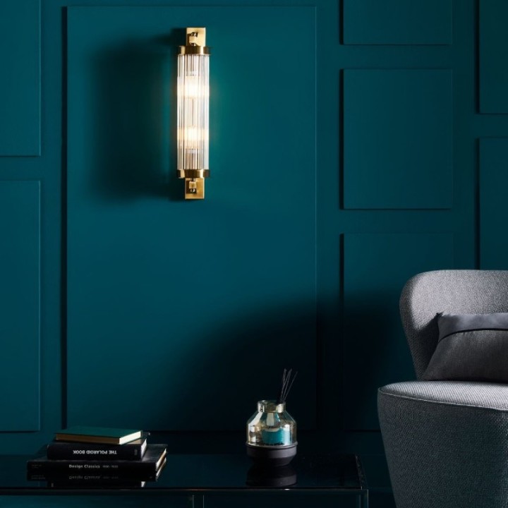 Gold brass finish metal wall light with glass tube