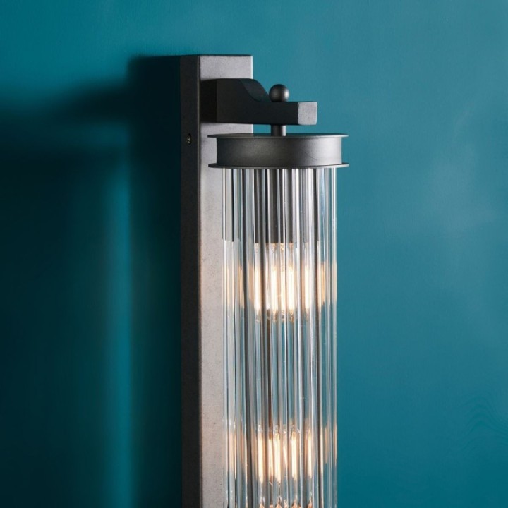 Metal tube wall light with grey metal finish and glass