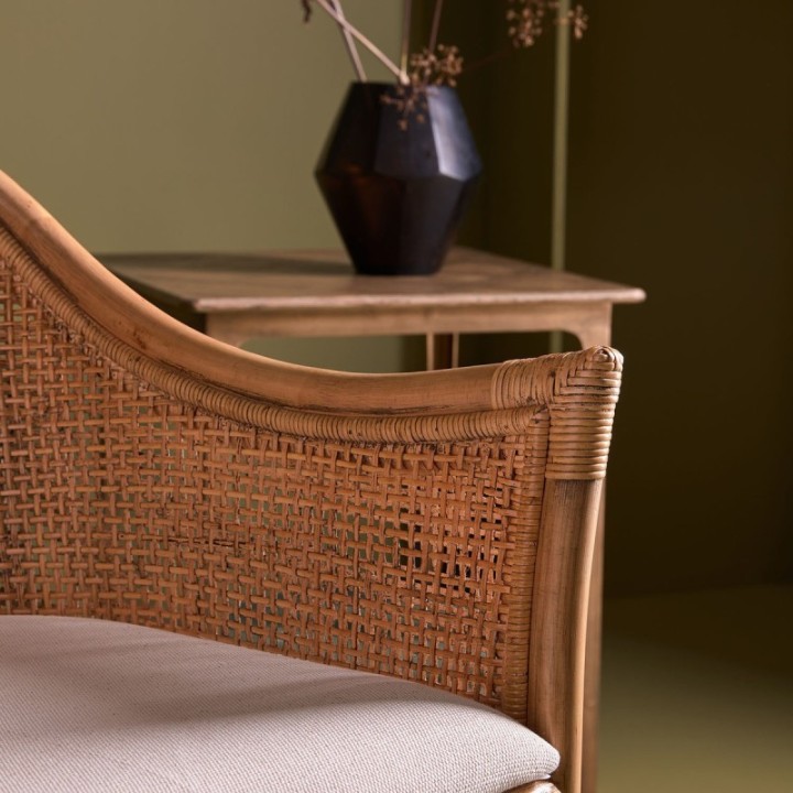 Maurice rattan armchair with fabric seat