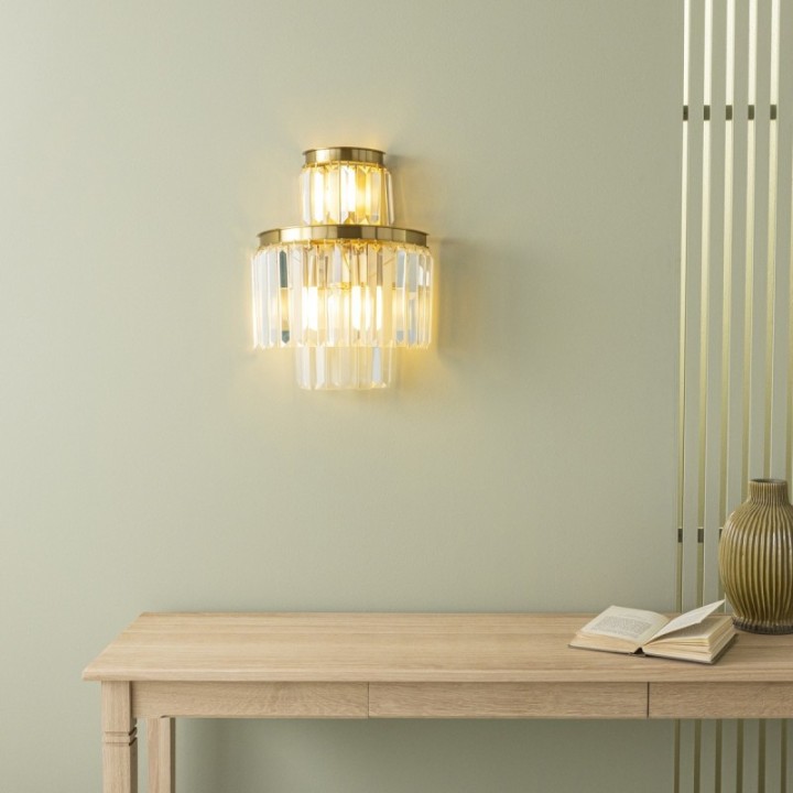 Fulgurant gold wall light