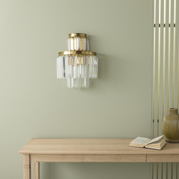 Fulgurant gold wall light