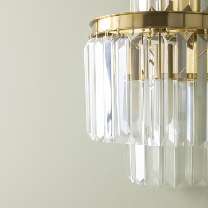 Fulgurant gold wall light
