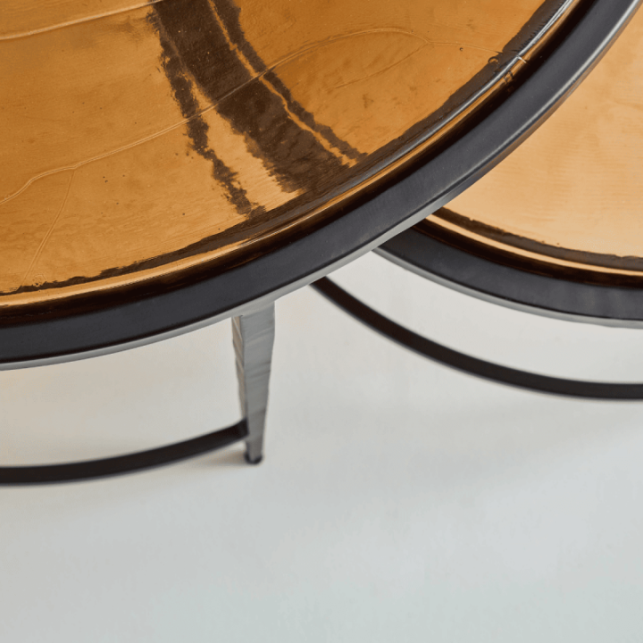 Igloo smoked glass and black metal nesting coffee tables